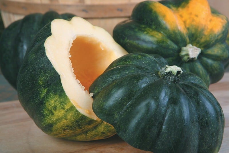 Sliced Acorn Squash on Wooden Surface Food Picture