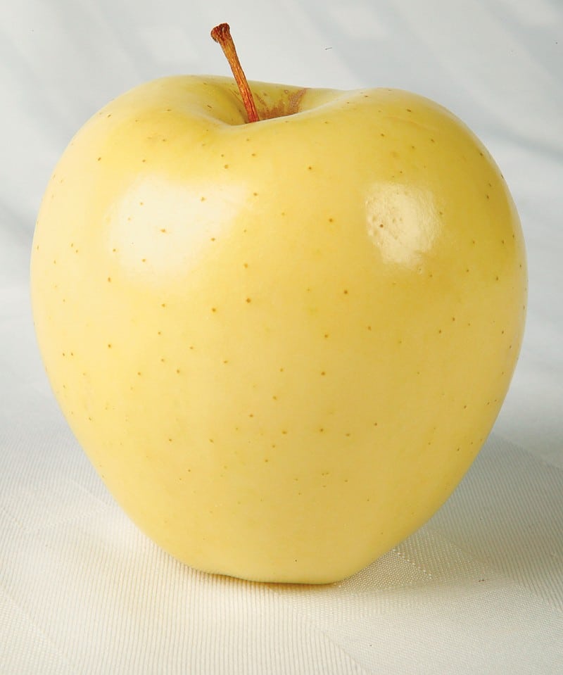 Golden Delicious Apple on White Surface Food Picture