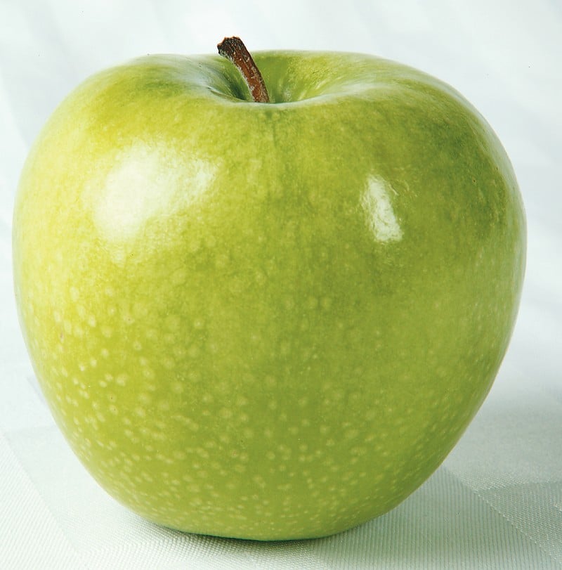 Granny Smith Apple on White Surface Food Picture
