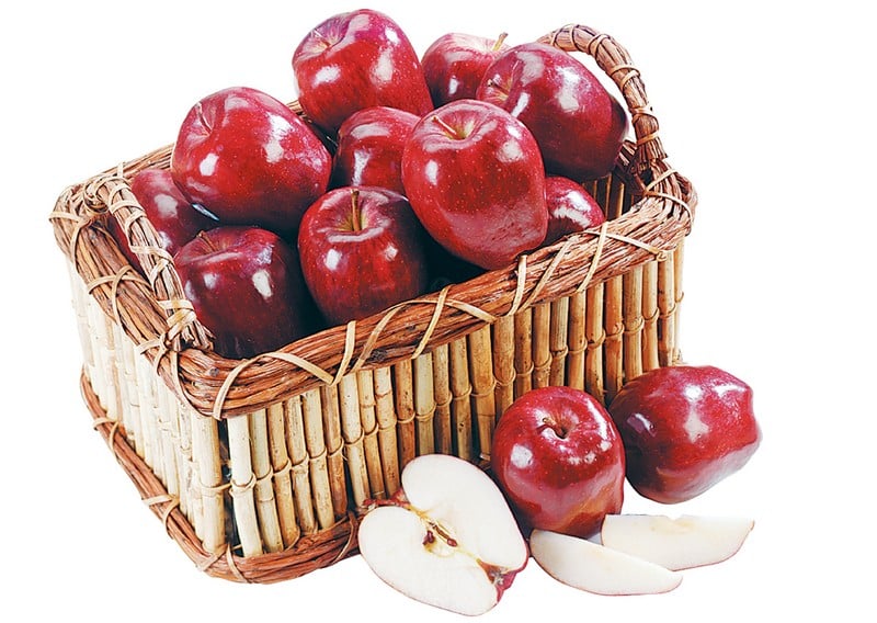 Basket of Whole and Sliced Red Delicious Apples Isolated Food Picture