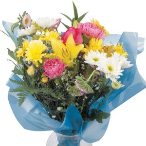 Floral Arrangement in Blue Wrap and Clear Vase Food Picture