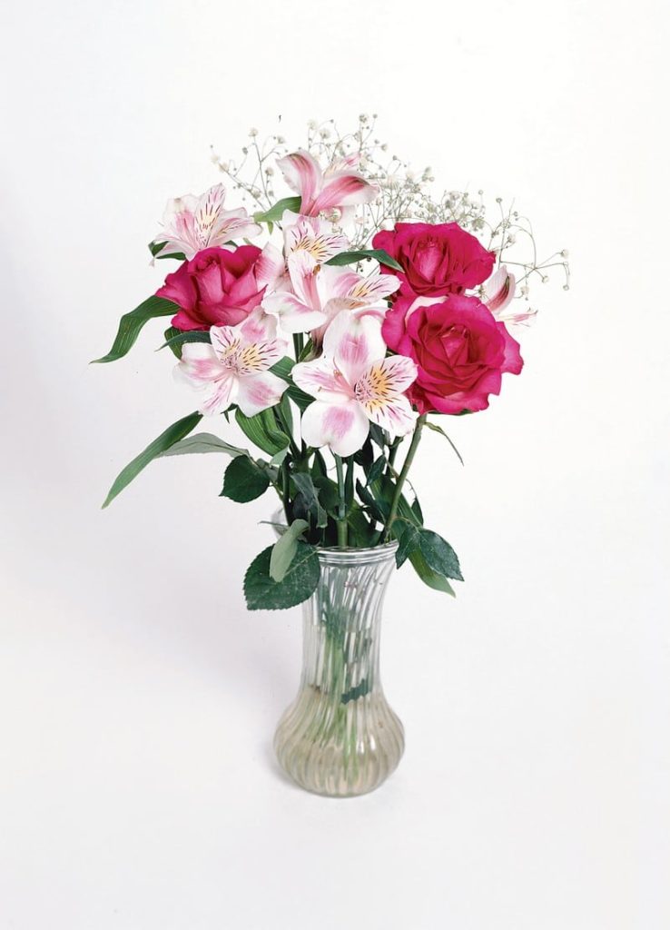 Azalea Floral Arrangement in Clear Vase Food Picture