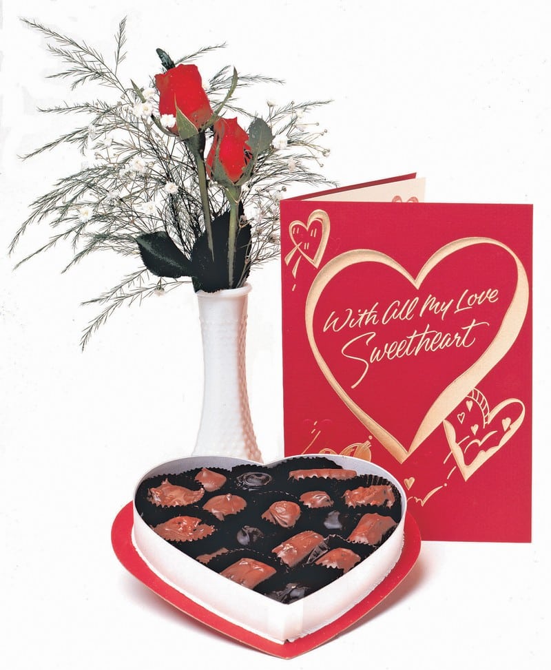Valentine's Roses in White Vase with Card and Chocolate Heart Food Picture