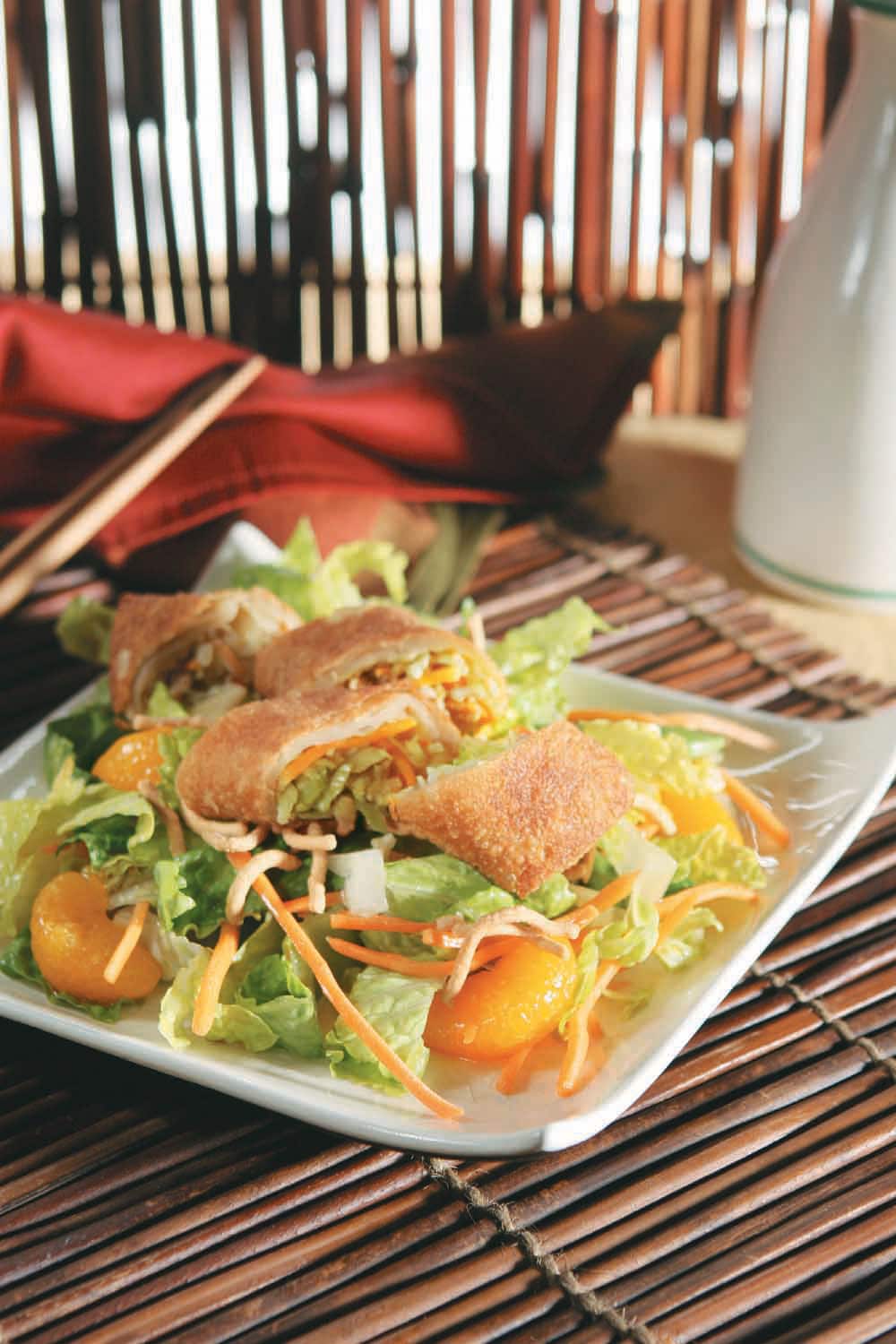 Asian Style Salad with Egg Roll Food Picture