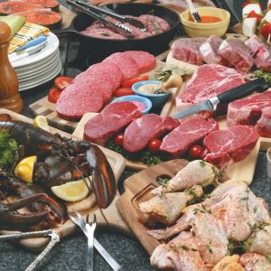 Large Assortment of Raw Meats and Seafood Buffet Style Spread Food Picture