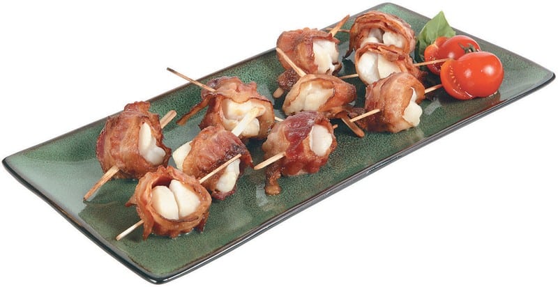 Bacon Wrapped Scallops on a Dish with Baby Tomatoes Food Picture