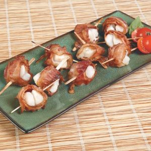Bacon Wrapped Scallops on Dish with Baby Tomatoes Food Picture