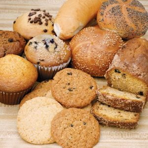 Assorted Baked Goods on Cutting Board Food Picture