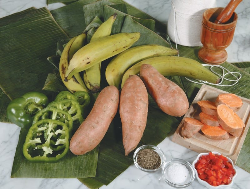 Assorted Produce and Fresh Ingredients Spread Out on Banana Leaves Food Picture