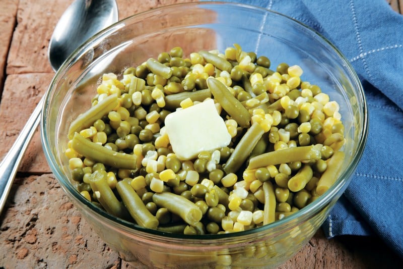Green Beans, Peas, and Corn with Butter in Clear Bowl Food Picture