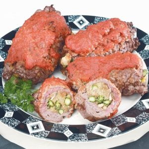 Aparagus Stuffed Cooked Beef Cube Steaks with Tomato Sauce Food Picture