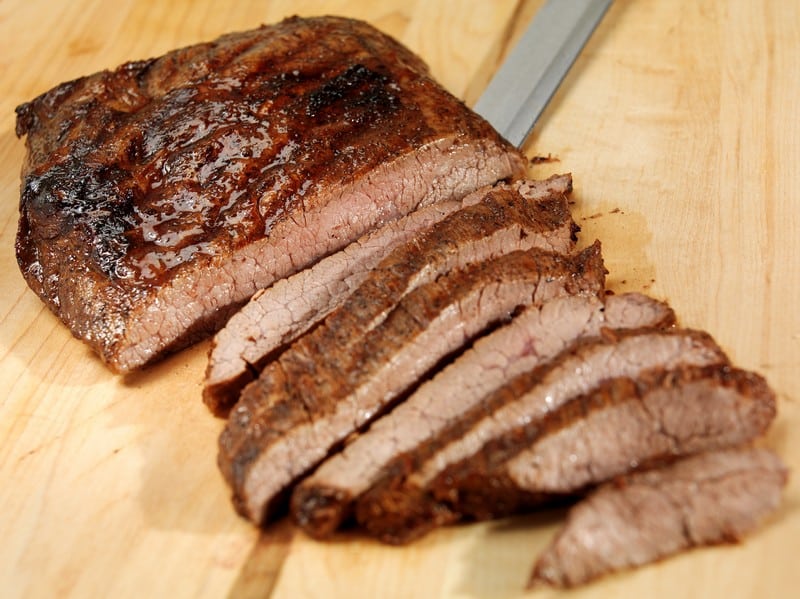 Sliced Cooked Beef Flank Steak on Cutting Board Food Picture