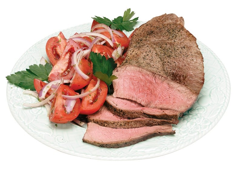 Fresh Cooked Beef London Broil with Tomatoes and Onions Food Picture