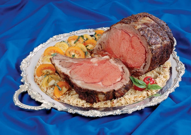 Cooked Beef Prime Rib Roast over Rice with Tomatoes Food Picture