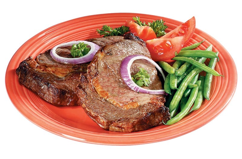 Cooked Beef Rib Eye Steak with Green Beans and Tomatoes Food Picture