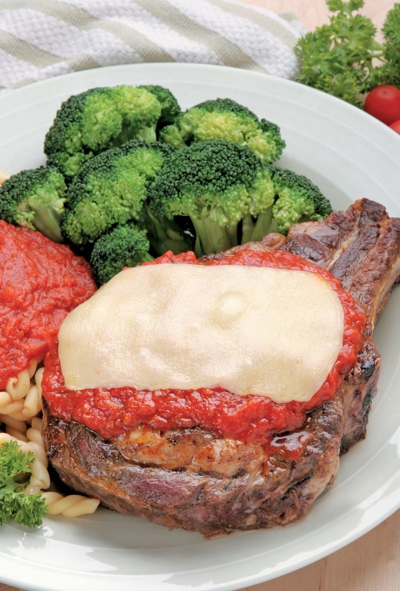 Cooked Bone-In Beef Rib Eye Steak with Pasta and Sauce Food Picture