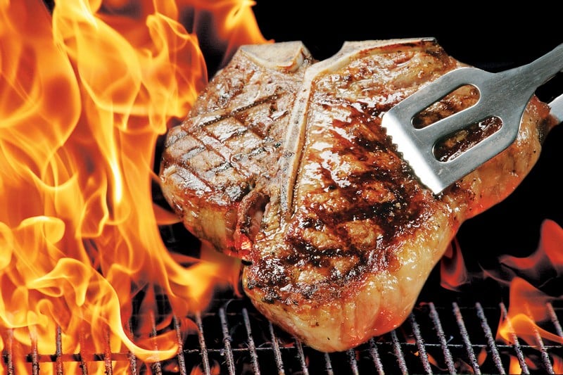 Beef T-Bone Steak over Flame on Grill Food Picture