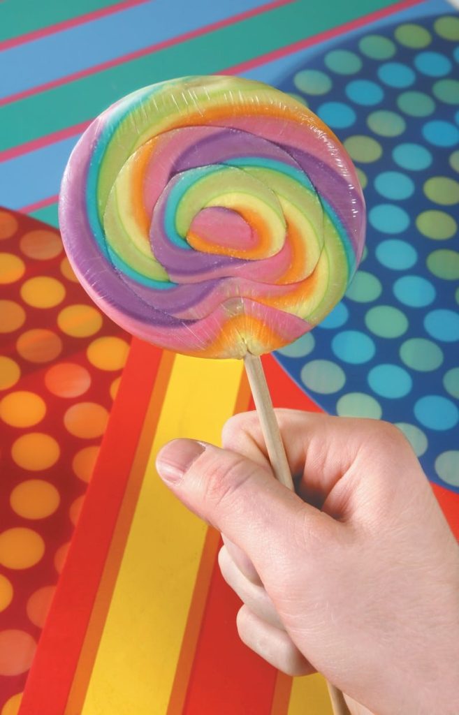 Large Rainbow Lollipop with Colorful Background Food Picture