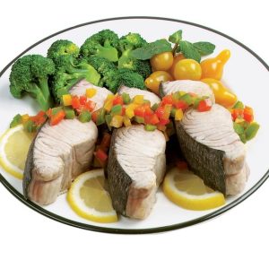 Blue Marlin Steak with Veggies and Garnish on White and Black Plate Food Picture