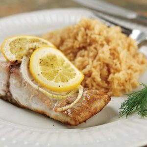 Bluefish Fillet on White Ridged Plate with Garnish Food Picture