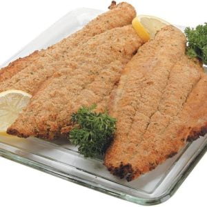 Breaded Catfish on Glass Plate with Lemon Slices Food Picture