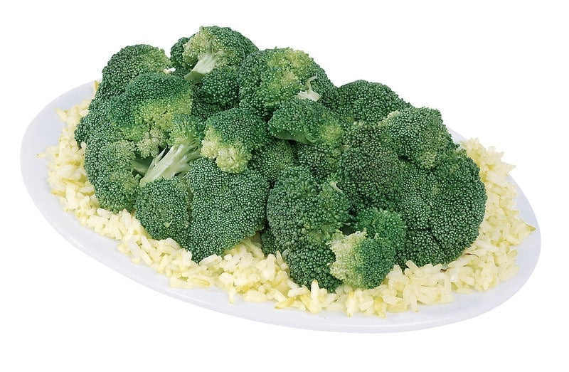 Broccoli over white rice on a white plate with a white background Food Picture