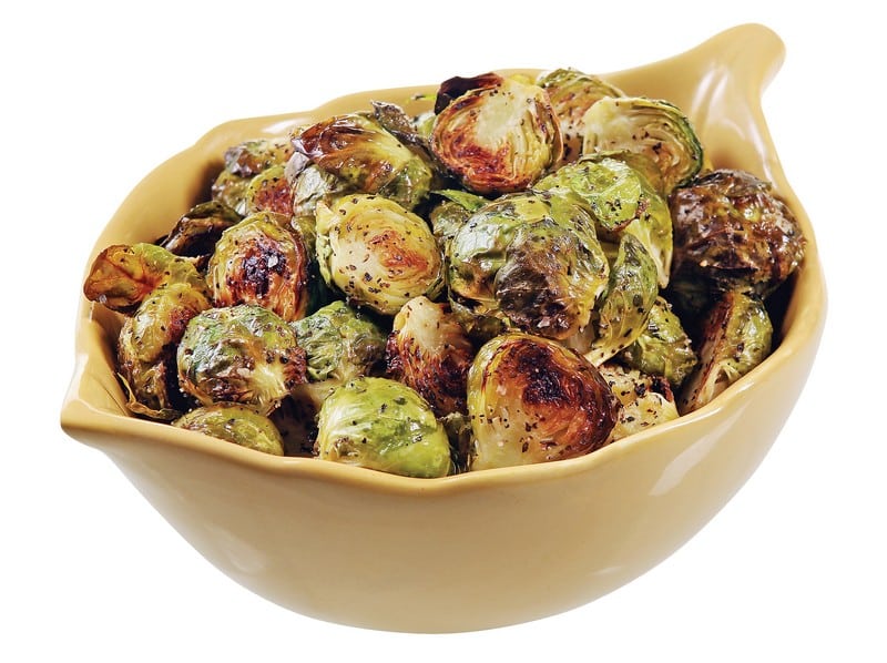 Prepared brussel sprouts in a bowl on a white background Food Picture