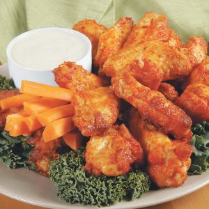 Buffalo Wings with Kale Garnish Food Picture