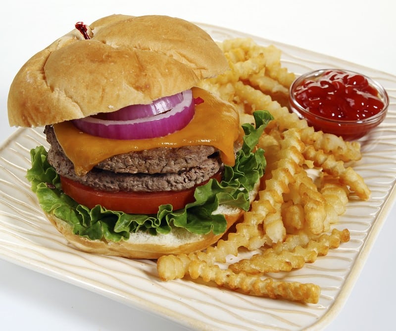 Double Cheeseburger with Lettuce, Onion and Tomato with Baked Crinkle Fries and Ketchup Food Picture