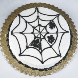 Spider Web Cake on Gold Cardboard Plate Food Picture