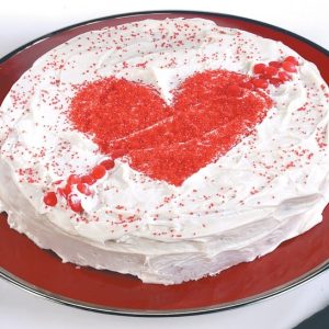 Valentines Day Cake with Heart and Arrow on Red Plate Food Picture