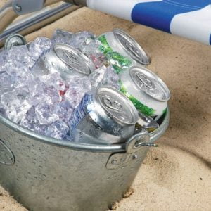 Cans of Soda in Bucket of Ice at The Beach Food Picture