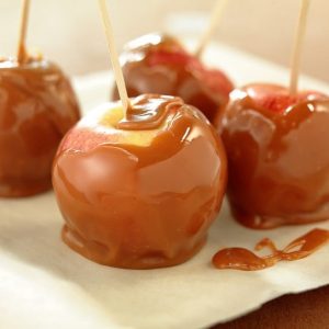 Gooey Sweet Caramel Apples on a Stick Food Picture