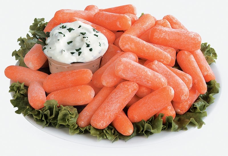 Baby Carrots over Greens with Dip Food Picture