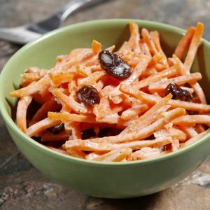 Crispy Carrot Raisin Coleslaw Salad in Bowl on Calico Slate Countertop Food Picture