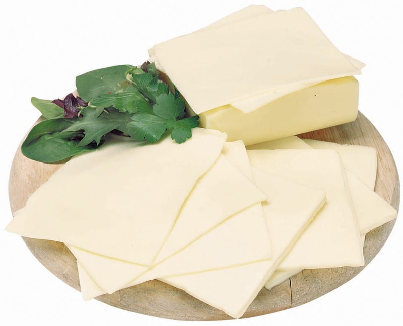 White American Cheese with Garnish on Wooden Surface Food Picture