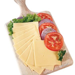 Sliced Yellow American Cheese with Garnish on Wooden Board Food Picture