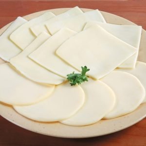 Sliced Cheese Assortment with Garnish on Plate Food Picture
