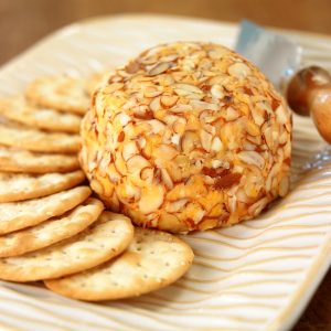 Cheese Ball with Almond Nut Topping and Crackers Food Picture
