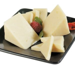 Sharp Cheddar Cheese with Garnish on Black Plate Food Picture