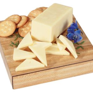 Sharp Cheddar Cheese with Crackers and Garnish on Wooden Board Food Picture