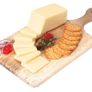Sharp Cheddar Cheese with Garnish on Wooden Board Food Picture