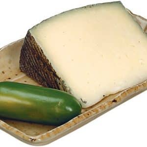 Manchego Cheese in Dish with Pepper Food Picture