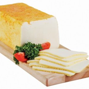 Muenster Cheese with Garnish on Wooden Board Food Picture