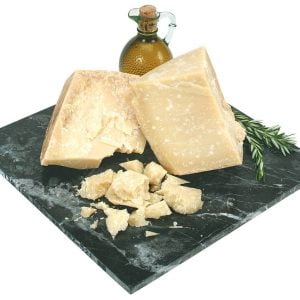Parmesan Cheese on Marble Stone with Garnish and Oil Food Picture