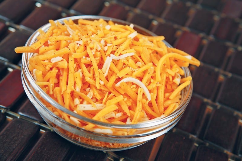 Shredded Cheese in Clear Bowl Food Picture