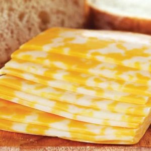 Sliced Colby Jack Cheese on Cutting Board Food Picture