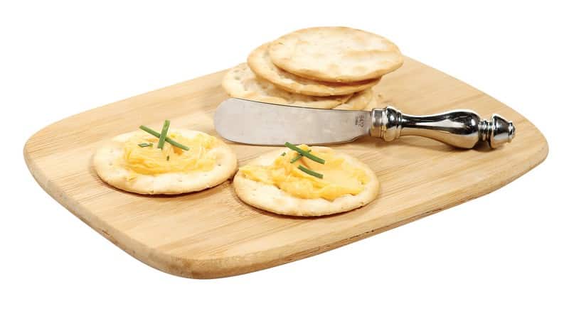 Spreadable Cheese with Crackers and Garnish on Wooden Surface Food Picture