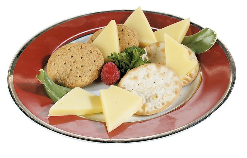 Swiss Cheese with Crackers and Garnish on Red Plate Food Picture