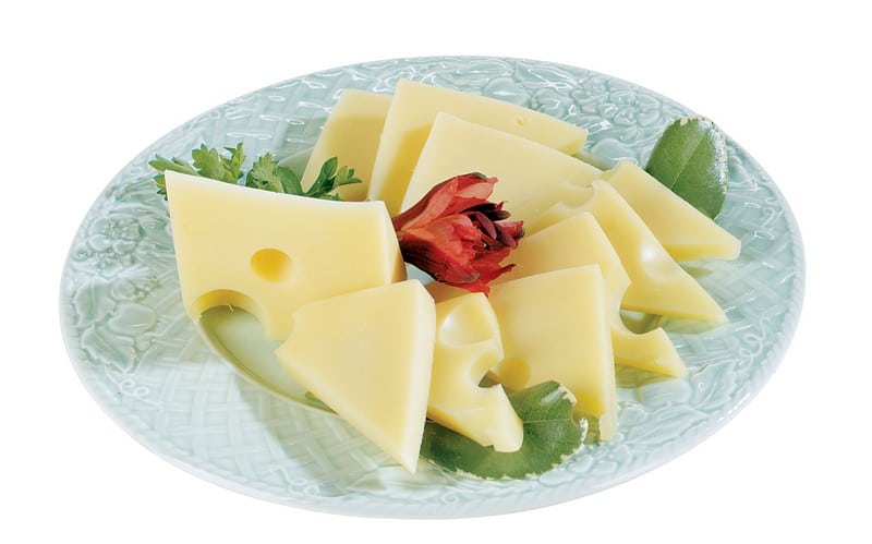 Swiss Cheese with Garnish on Light Blue Plate Food Picture
